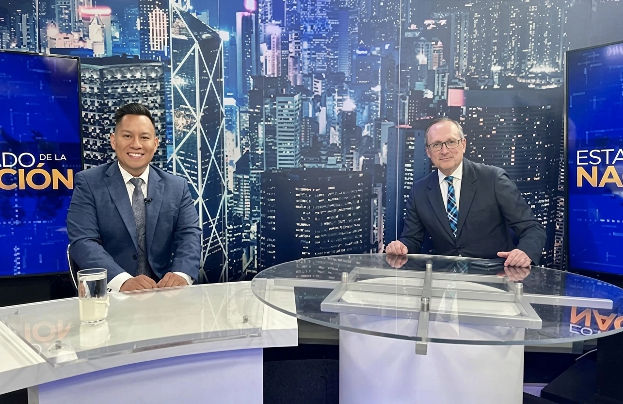 Oscar A. Ischiu interviewed in a television studio